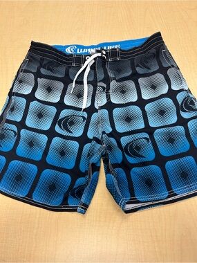 WaveLife Men's Blue and Black Patterned Swim Trunks size 36